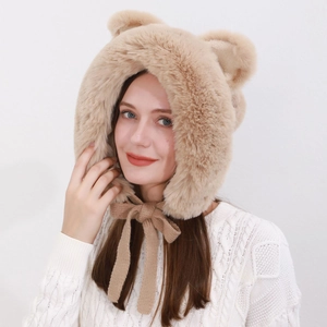 Detail of plush fox ears hat with cozy knit drawstrings and soft faux fur texture