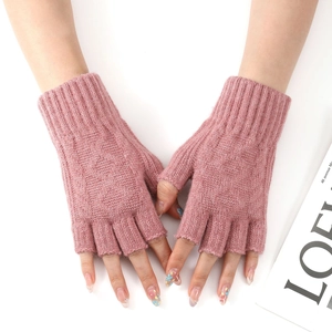 Close-up of pink knit fingerless arm warmers with detailed ribbed cuffs and texture