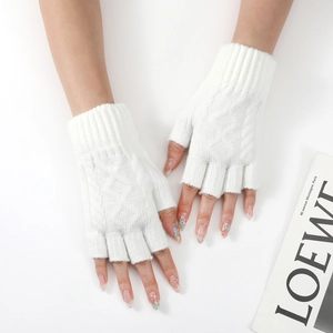 Detailed cable knit pattern on white arm warmers with flexible fingerless design