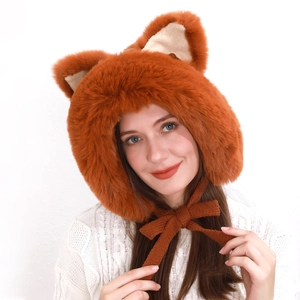 Vibrant orange plush fox ear hat with brown knit straps and soft faux fur lining