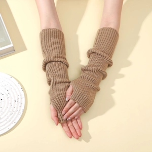 Close-up of khaki ribbed knit arm warmers with a stylish layered and slouchy texture