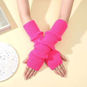 Close-up of pink neon ribbed knit arm warmer sleeves with thick texture and high elasticity