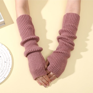 Women long fingerless knit arm warmers in dusty rose pink with ribbed texture style