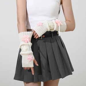 Y2K style white knitted arm warmers with plush sequin stars and pink ribbon bows