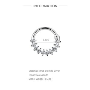 Detail of 925 sterling silver hoop earring with nine inlaid moissanite stones