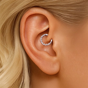 Macro view of S925 sterling silver ear cuff set with sparkling moissanite stones