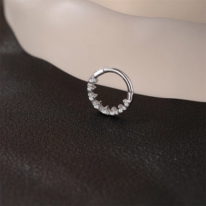 Detailed view of s925 silver clicker ring featuring a crown pattern of small zircon stones