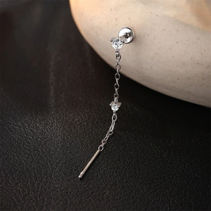 Detail of S925 sterling silver tassel earring featuring sparkling moissanite and chain
