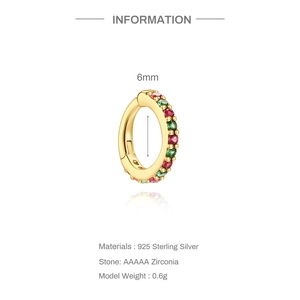 Detail view of 925 sterling silver hoop earring with red and green AAAAA zirconia