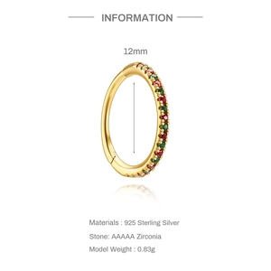 Detail of 925 silver hoop ring with pink and green zircons and 12mm inner diameter