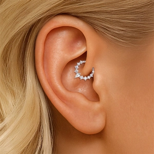 Macro view of S925 sterling silver earring with teardrop moissanite and pave stones