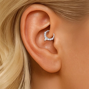 Close-up of S925 sterling silver ear cuff with marquise and round moissanite stones