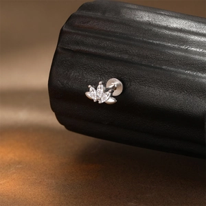Macro view of S925 sterling silver cartilage stud featuring marquise-cut zircon stones