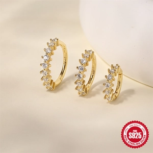 Three gold plated S925 sterling silver huggie earrings with white cubic zirconia rows