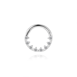 Detailed view of silver s925 clicker ring set with sparkling round moissanite stones