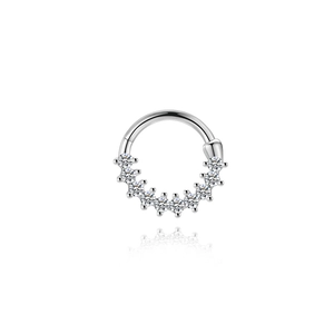 Macro detail of S925 sterling silver ear cuff set with nine sparkling moissanite stones