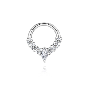 Detail of S925 silver piercing ring with marquise and round cut white zircons