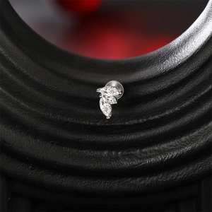 Macro view of cluster S925 silver stud earring with marquise cut sparkling moissanite