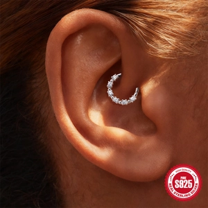 Elegant S925 sterling silver ear cuff with moissanite stones on a real ear model