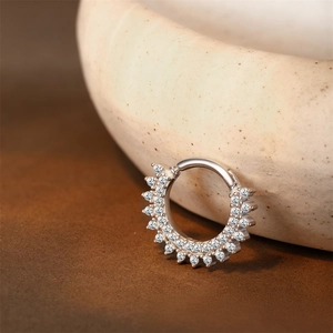 Detailed close-up of S925 sterling silver hoop earring with paved moissanite stones