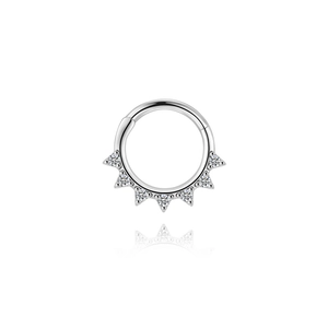 Macro detail of S925 silver clicker ring with seven sparkling moissanite spiked accents