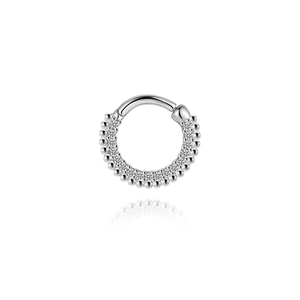 Macro shot of S925 silver flower clicker ring with moissanite pave setting and beads