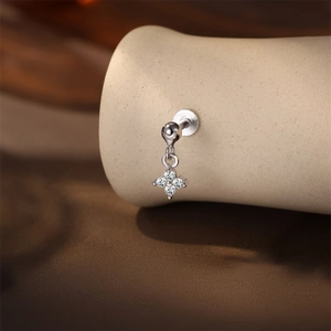 Close-up of S925 sterling silver four-leaf clover stud with zircon paved details