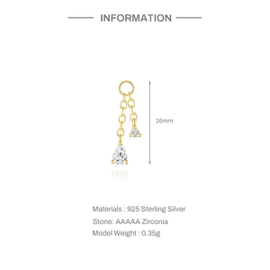 Detail of 925 sterling silver drop earring featuring AAAAA cubic zirconia with gold finish