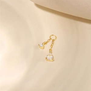 Detail of S925 sterling silver gold plated earrings pendant with teardrop zircon stones