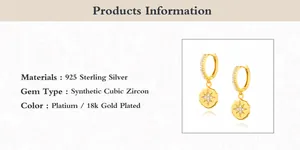 Detail of 925 sterling silver 18k gold earrings with starburst cubic zirconia charms