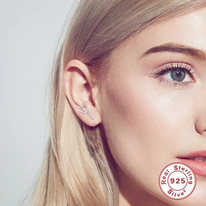 Elegant S925 sterling silver branch leaf ear cuff earring worn by a model