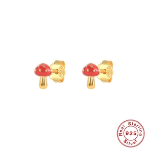 Macro detail of red mushroom stud earrings in S925 silver with hallmark engraving