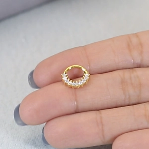 Minimalist S925 sterling silver gold nose hoop with sparkling CZ stones on fingertip