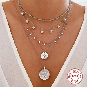 Layered S925 sterling silver necklace set with star and leopard pendants on model