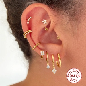 Elegant 925 sterling silver gold-plated ear piercing set with floral zircon studs
