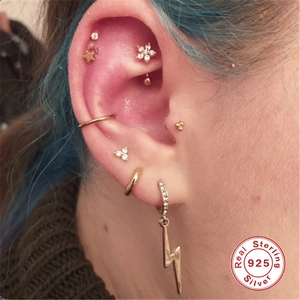 S925 sterling silver ear piercing set featuring lightning, star and flower stud earrings