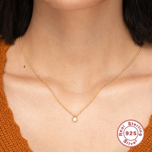 Minimalist S925 sterling silver gold plated necklace with a single round diamond pendant