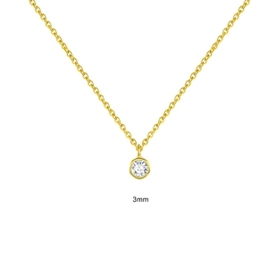 Macro detail of 3mm single diamond pendant on gold-plated sterling silver necklace