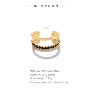 Detail view of gold double-layer silver ear cuff with black AAAAA zirconia stones