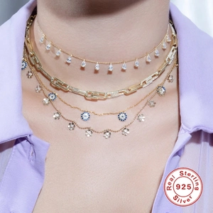 Layered 925 sterling silver necklace with evil eye charm and water drop zircon accents