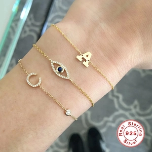 Set di tre bracciali in argento 925 placcato oro con occhio di Allah e ciondolo lettera A