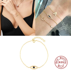 Bracciale in argento sterling S925 placcato oro con zircone blu e pendente a forma di occhio