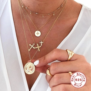 S925 sterling silver gold plated necklace set with star and coin pendant on model