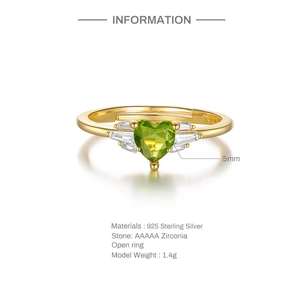 Detailed macro view of S925 sterling silver ring with green heart zirconia