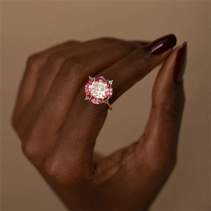 Macro view of a luxury S925 silver ring featuring a large square diamond and pink gems