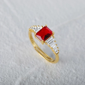 Macro view of S925 sterling silver ring featuring a large red rectangular gemstone