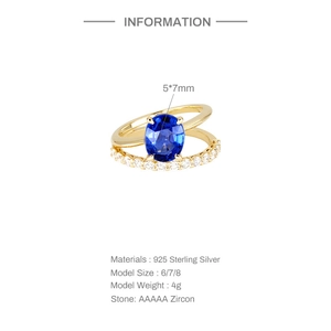 Detail view of double-layer S925 sterling silver ring with blue oval zircon and diamonds