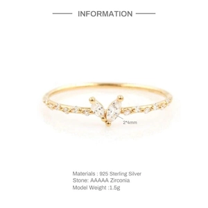 Detail of S925 sterling silver ring featuring double V-shaped AAAAA zirconia stones