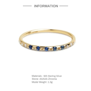 Detail of 925 sterling silver ring with blue and white AAAAA zirconia settings