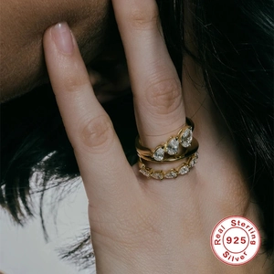 Double-layered S925 sterling silver gold plated rings with pear-cut white stones